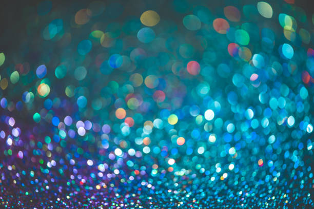istock bokeh effect glitter colorful blurred abstract background for birthday, anniversary, wedding, new year eve or Christmas 1348514466