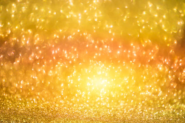 istock bokeh effect glitter colorful blurred abstract background for birthday, anniversary, wedding, new year eve or Christmas 1348516800