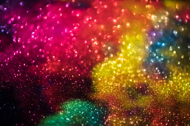 istock bokeh effect glitter colorful blurred abstract background for birthday, anniversary, wedding, new year eve or Christmas 1348516840