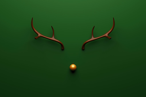 Christmas reindeer concept made of wooden and gold bauble decoration and antlers on green background. 3d rendering illustration