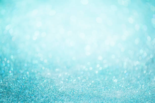 istock bokeh effect glitter colorful blurred abstract background for birthday, anniversary, wedding, new year eve or Christmas 1348528324