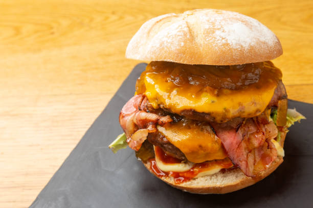 istock Juicy Classic burger with bacon and cheese 1348531199