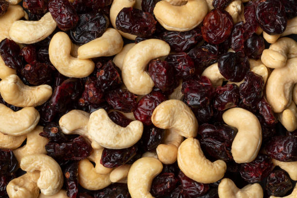 Cashew nuts and cranberries full frame close up