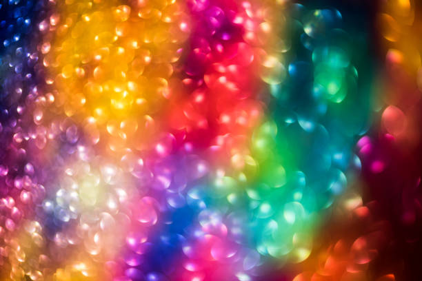 istock bokeh effect glitter colorful blurred abstract background for birthday, anniversary, wedding, new year eve or Christmas 1348538547