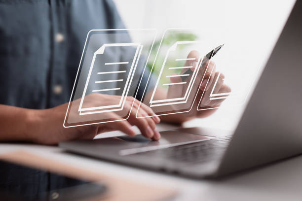 istock Concept of document management using symbols on a virtual screen, ERP 1348543158