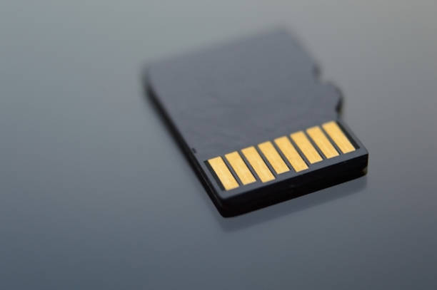istock micro sd card. macro photography, shallow depth of field. 1348544570