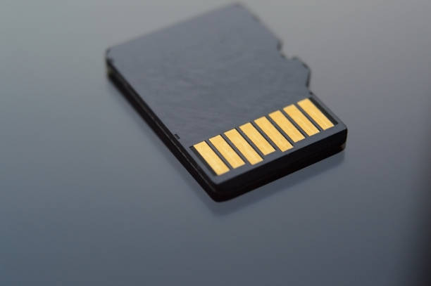 istock micro sd card. macro photography, shallow depth of field. 1348544574