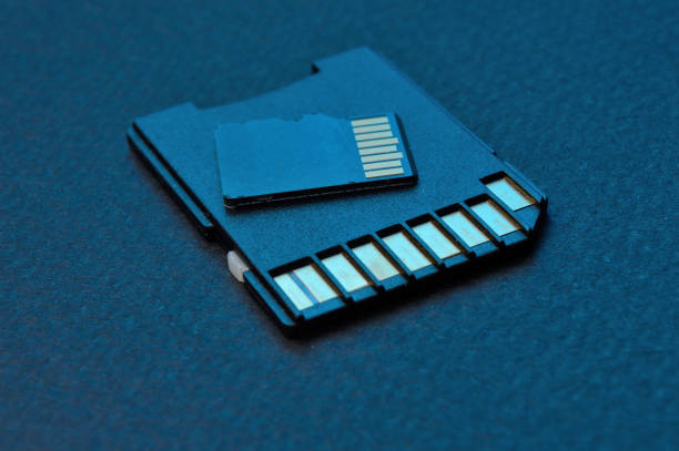 istock micro sd cards lie on a black background 1348544612