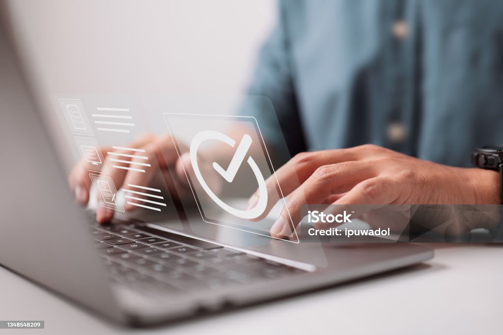 Certification for quality control, which ensures that the company product meets its standards. On the virtual screen, there is a concept. Obedience Stock Photo
