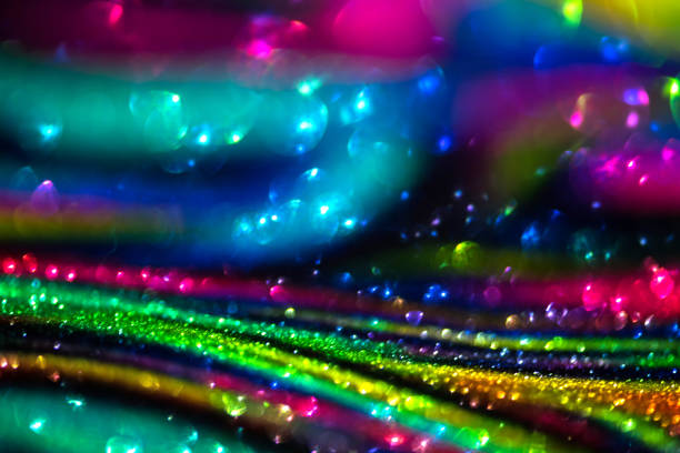 istock bokeh effect glitter colorful blurred abstract background for birthday, anniversary, wedding, new year eve or Christmas 1348557570