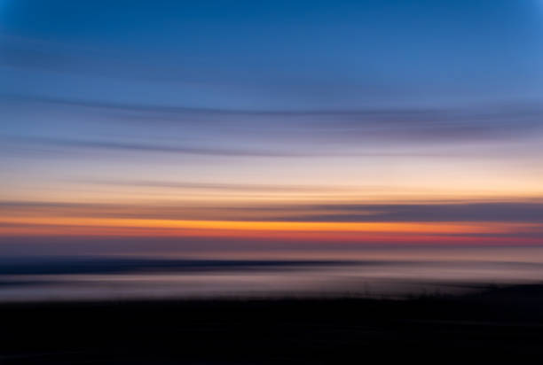 istock Abstract image of colorful Maine sunset 1348565809