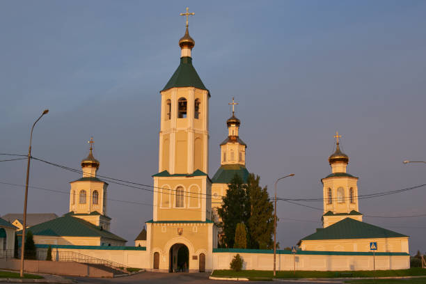Gate bell tower Makarovka, Mordovia, Russia - August 14, 2021: Gate bell tower of Makarovsky monastery. mordovia stock pictures, royalty-free photos & images