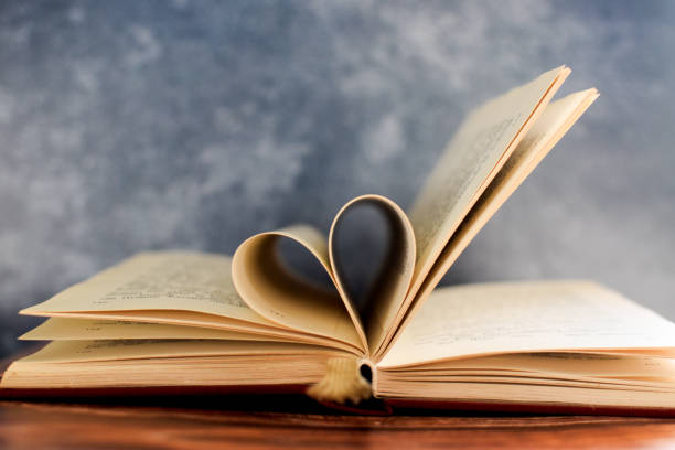 istock Book with a heart made of paper pages 1348567708