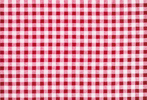 Gingham pattern in red and white, closed up texture of red and white for background. Picnic table cloth. stock photo