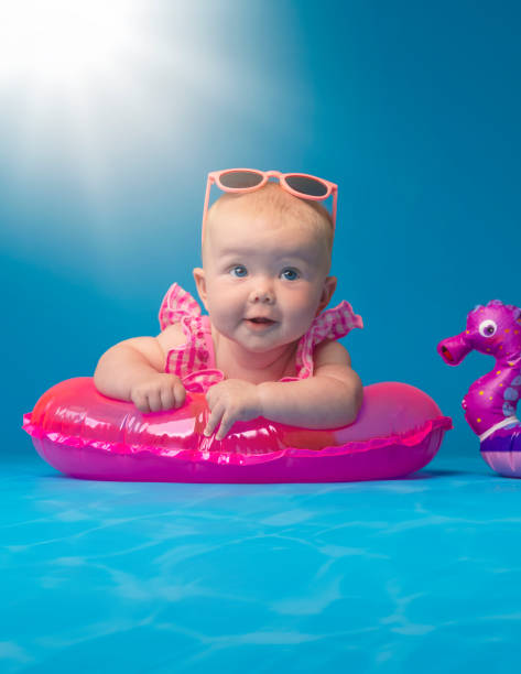 istock Summer Swim Baby 1348570984