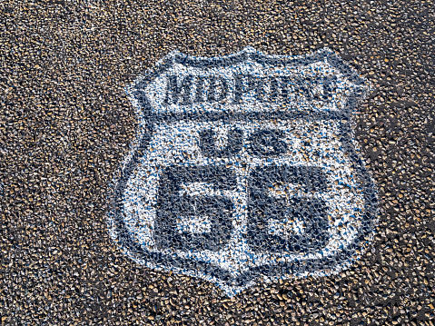 Midpoint painted sign of Historic Route 66 in Adrian, Texas.