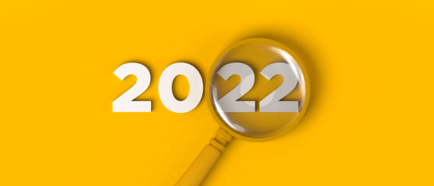 istock Magnifying glass focusing on the year 2022. Copy space. 3D illustration. 1348575673