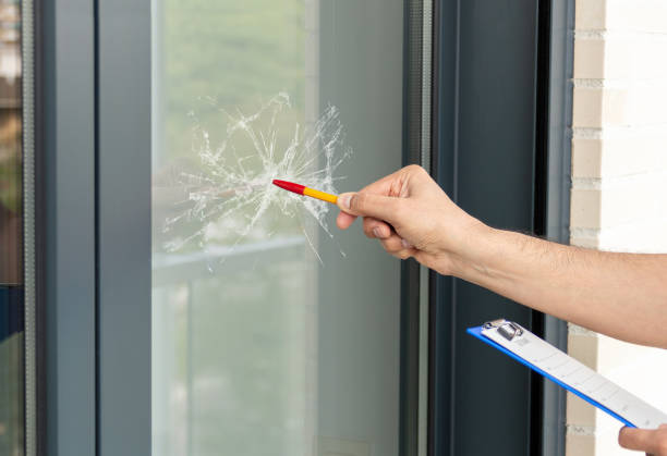 man checking to repair glass in a house - shattered glass broken window damaged imagens e fotografias de stock