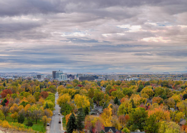 istock Fall colored trees cover Boise Leading to the skying 1348595504