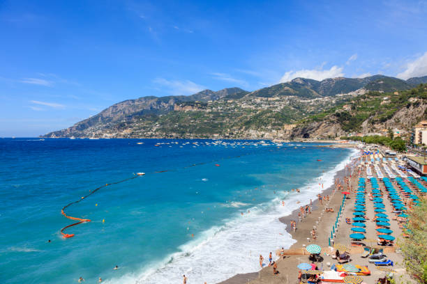istock Beautiful sand beach with turquoise warm water 1348595570