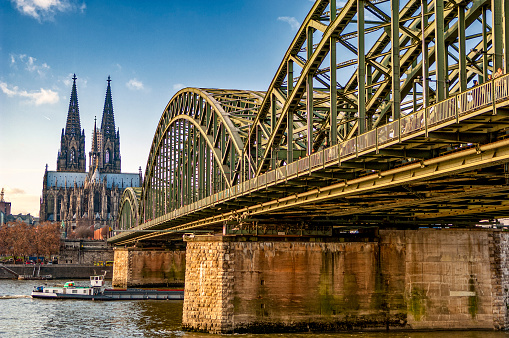 City view of Cologne with the Cologne Cathedral and its two characteristic towers and the Hohenzollern Bridge over the river Rhine