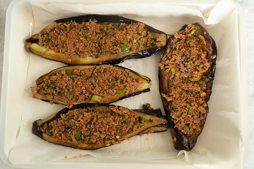 Turkish traditional eggplant dish - Karnıyarık. preparing Turkish traditional eggplant dish