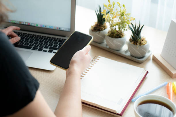 istock Young woman working from home 1348618175