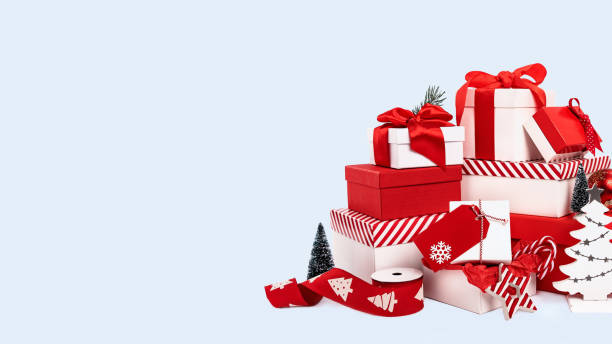 set of red and white gift boxes on white background - candy hard candy wrapped variation imagens e fotografias de stock