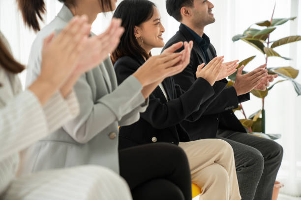 istock Businesswoman proficiently present work project receive celebrations from team 1348644100