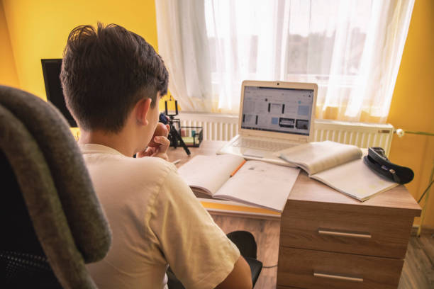 istock Desk of a young student 1348645184