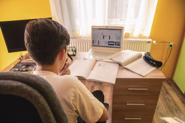 istock Desk of a young student 1348645187