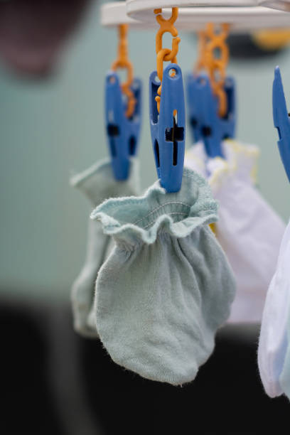 istock baby clothes hanging on a clothesline 1348661765
