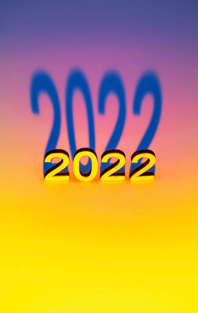 istock 2022 - number with shadow, on colourful background. New year festive concept. Minimalism style, copy space. 1348663521