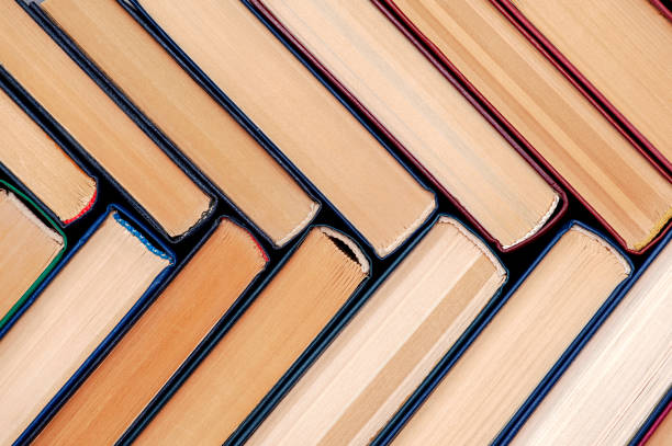 istock Old hardback books, top view. Close up 1348665395