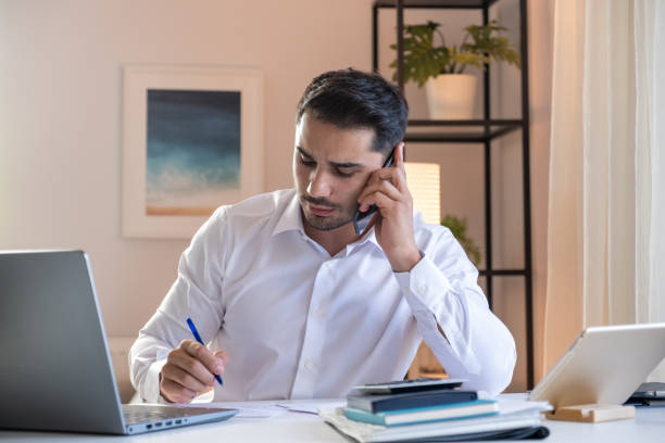 istock Businessman working in home office 1348665906
