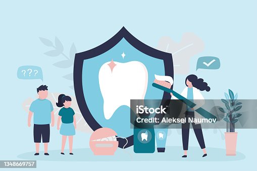 istock Woman holding big toothbrush with paste. Various tools for maintaining oral hygiene. Dentist explains hygiene rules to children 1348669757