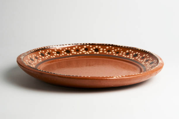 mexican art, clay dish decorated - earthenware imagens e fotografias de stock