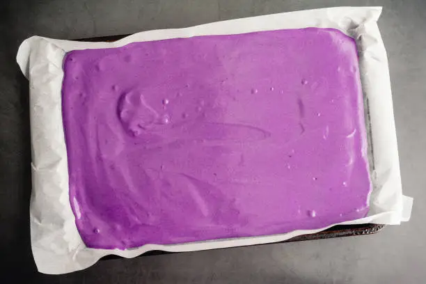 Raw cake batter made with purple sweet potatoes