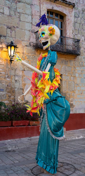 istock Day of the Dead Catrina Holding Light 1348675871