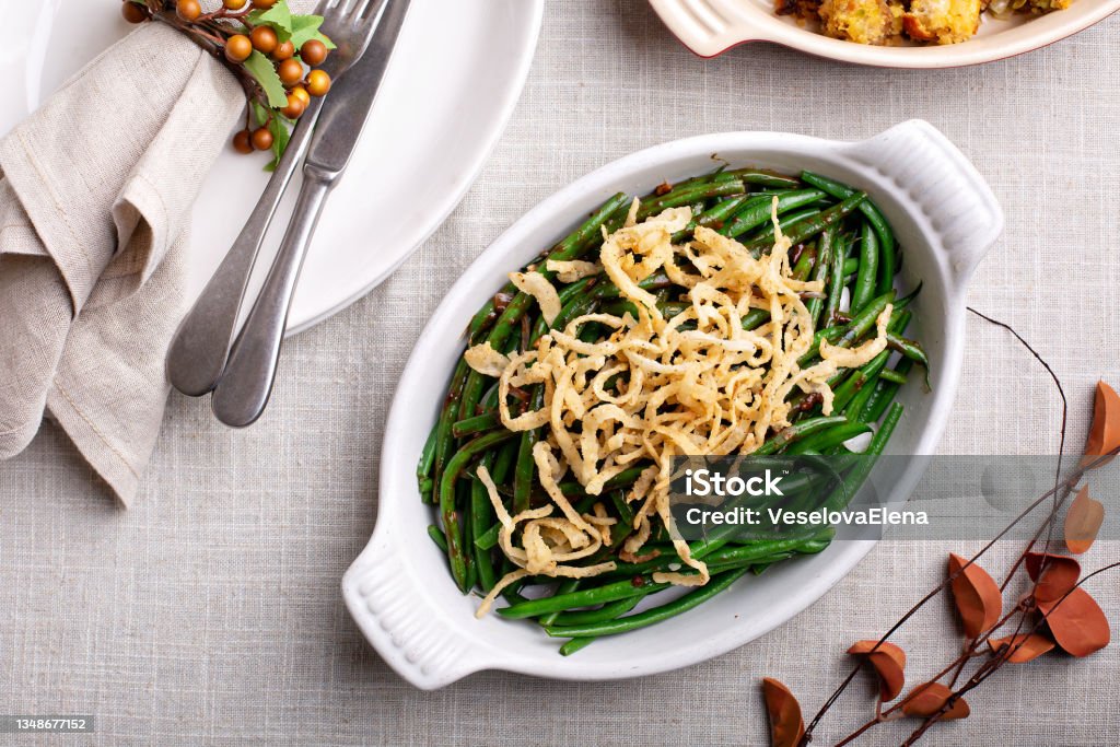 Traditional Thanksgiving side dish, green beans Traditional Thanksgiving side dish, green beans casserole with onions Green Bean Stock Photo