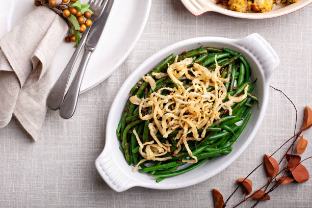 Traditional Thanksgiving side dish, green beans Traditional Thanksgiving side dish, green beans casserole with onions thanksgiving full stock pictures, royalty-free photos & images