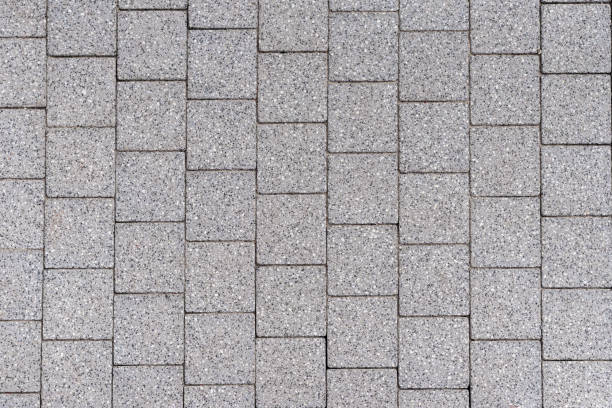 istock Top view gray square paving slabs, background. 1348678946