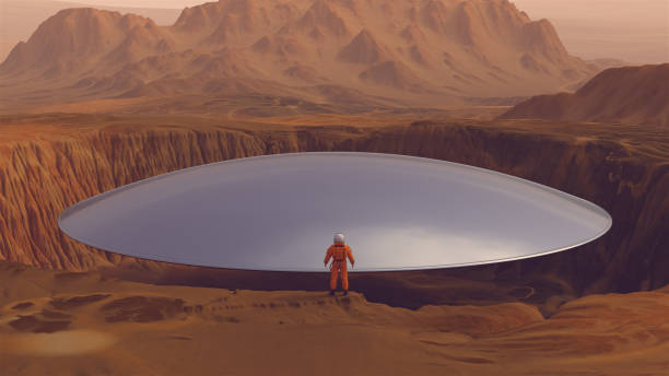 istock Astronaut Spacecraft Large Crater Alien Silver UFO Retro Disc Floating Arid Mountain Extra-Terrestrial Planet Desert Landscape 1348688091