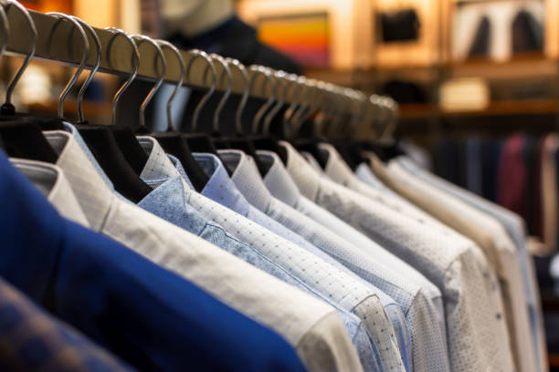 istock Shirts shopping close-up on hangers. 1348697005