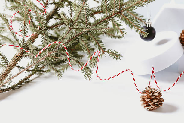 istock Christmas composition. Spruce branches podium cones and Christmas balls 1348700373