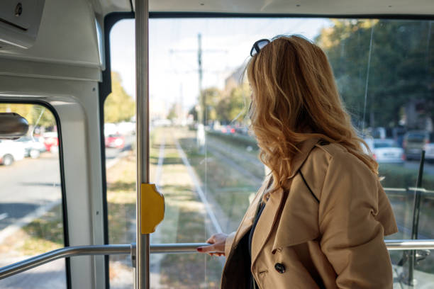 istock Woman commuting to work by tram 1348707830