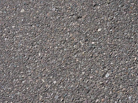 Close up background of a blacktop street.