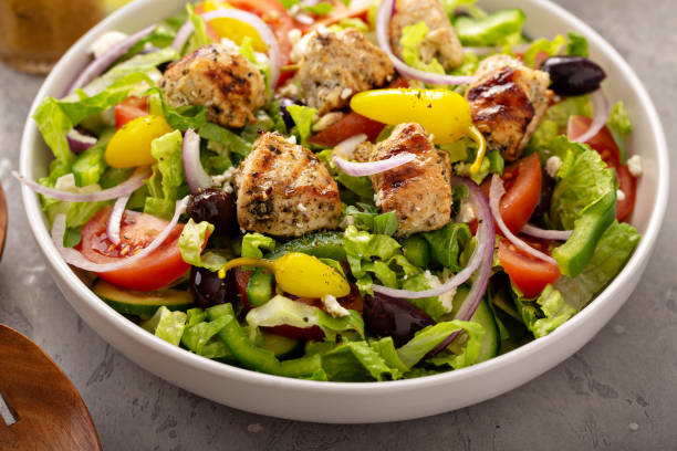istock Greek salad with grilled chicken vinaigrette dressing 1348716606