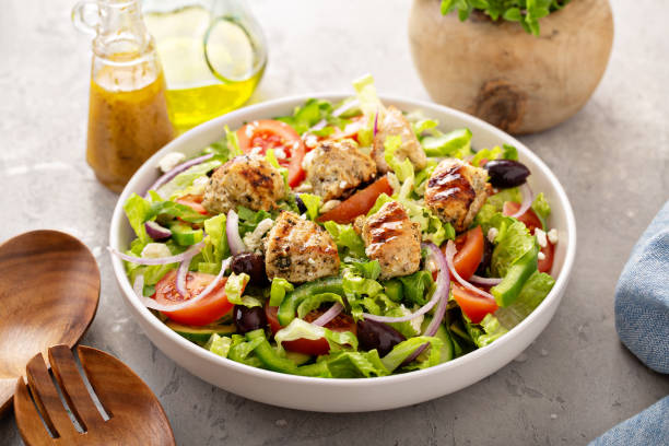 istock Greek salad with grilled chicken vinaigrette dressing 1348716652