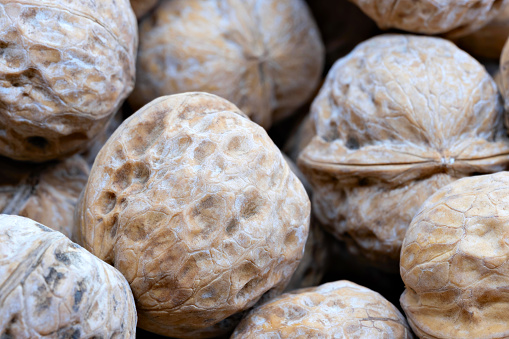 Walnuts close up as background